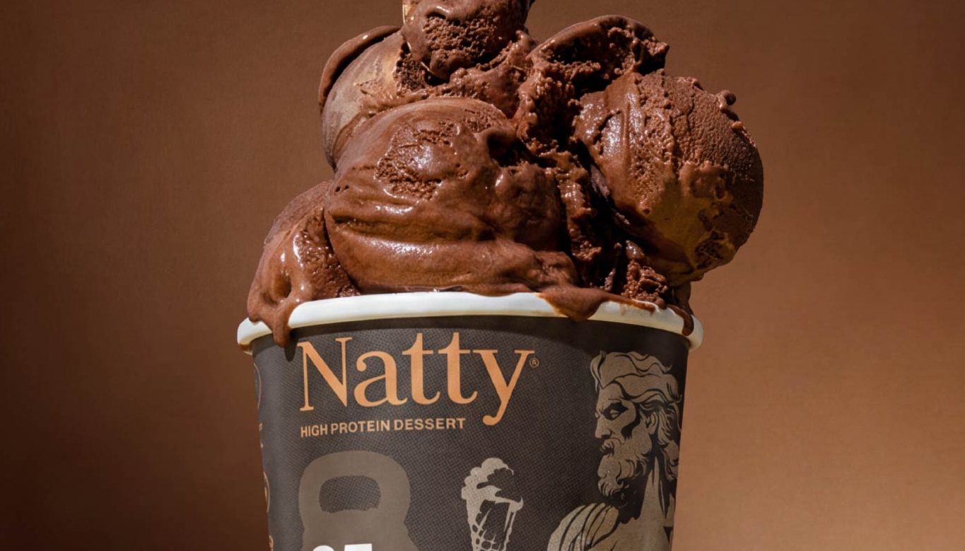 Dutch chocolate scoops over the Natty pint, close enough to see the fudge folds.